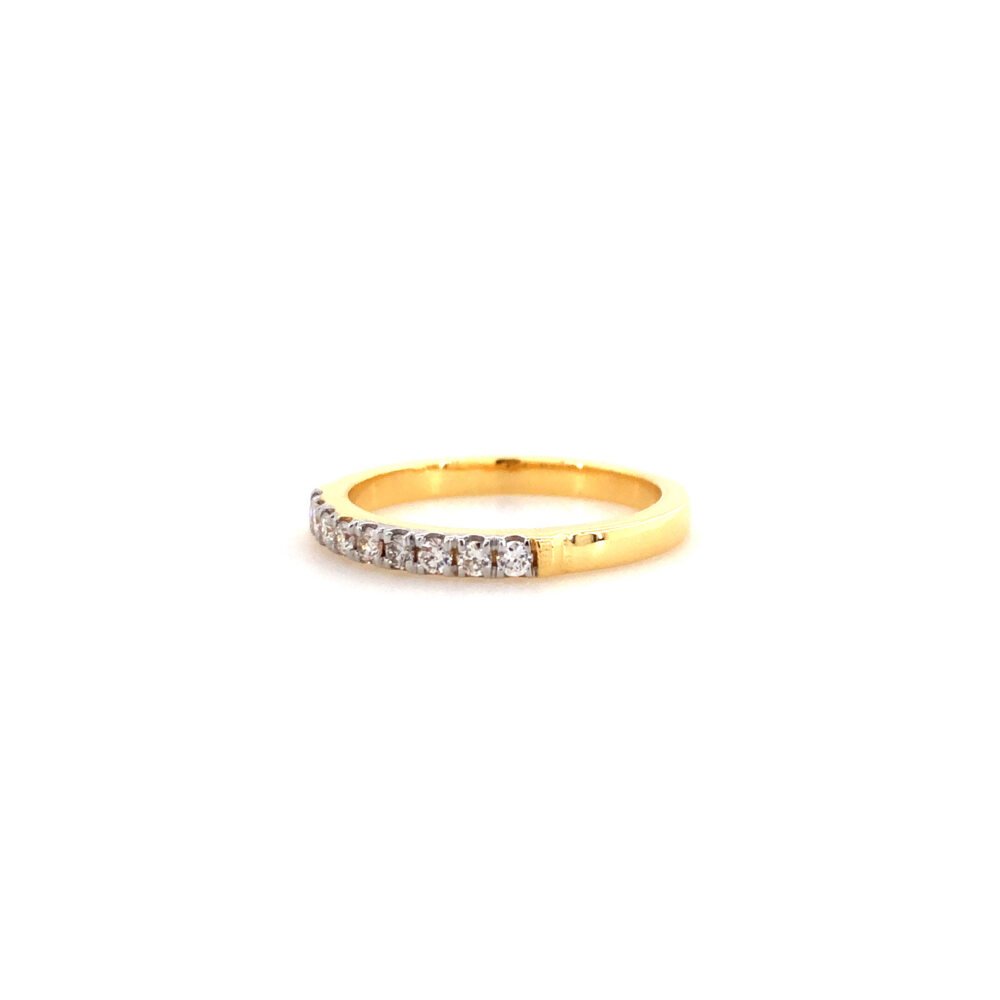 Gold ring with diamond accents.