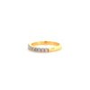 Gold ring with diamond accents.